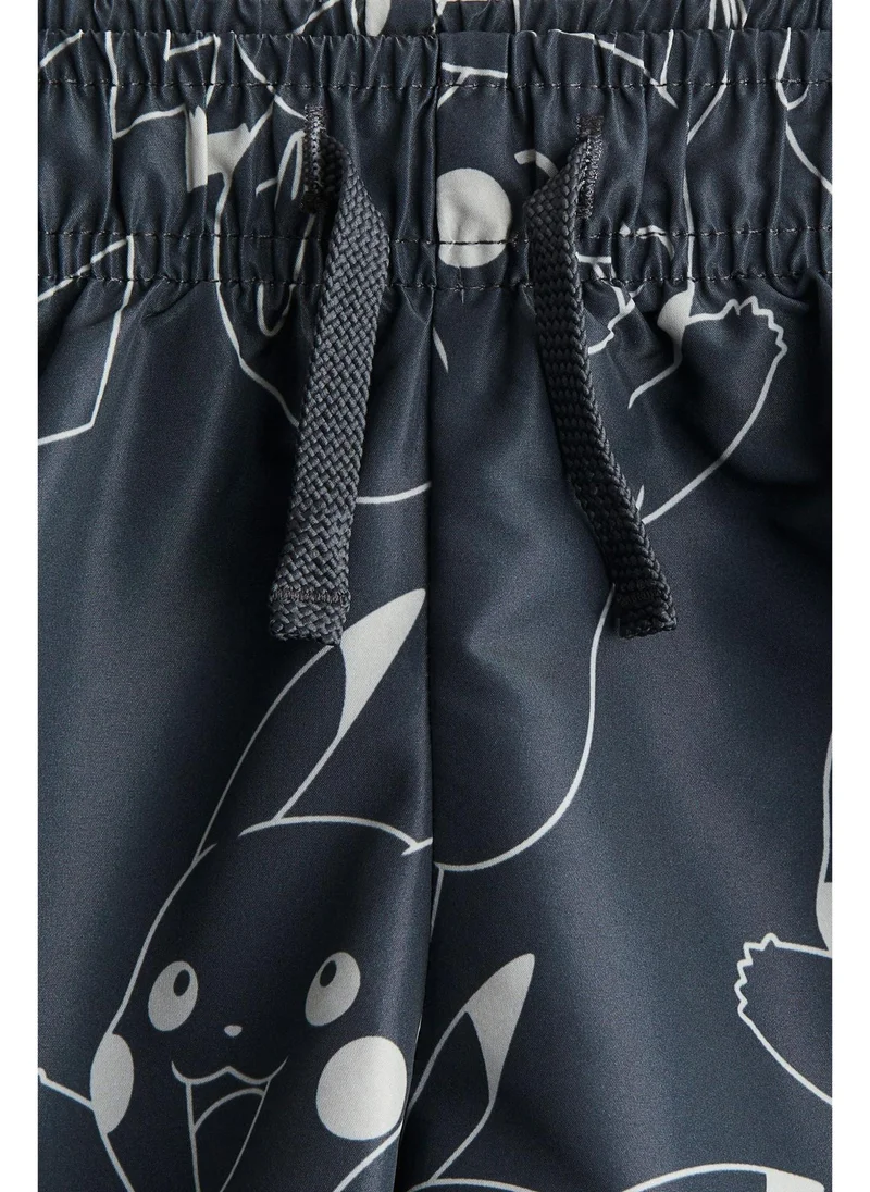 اتش اند ام Printed swim shorts