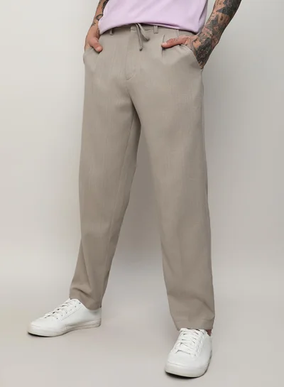 Campus Sutra Men's Oatmeal Beige Solid Tailored Trousers