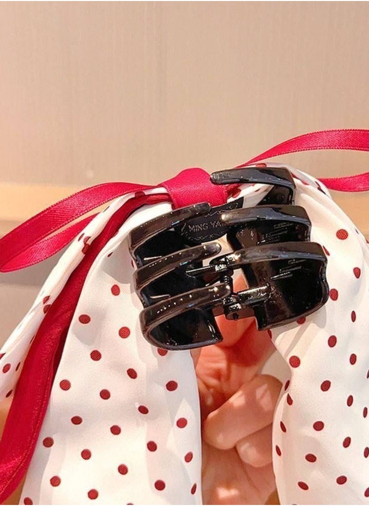 Generic - Add a touch of femininity and sophistication to your look with this hair bow. Designed with a double bow, this combination of white fabric is embellished with a heart and red dot pattern, finished with red satin trim for a stunning finish. The bow comes with a sturdy clip that secures the hair in place, perfect for anniversaries or special occasions. - Image 1