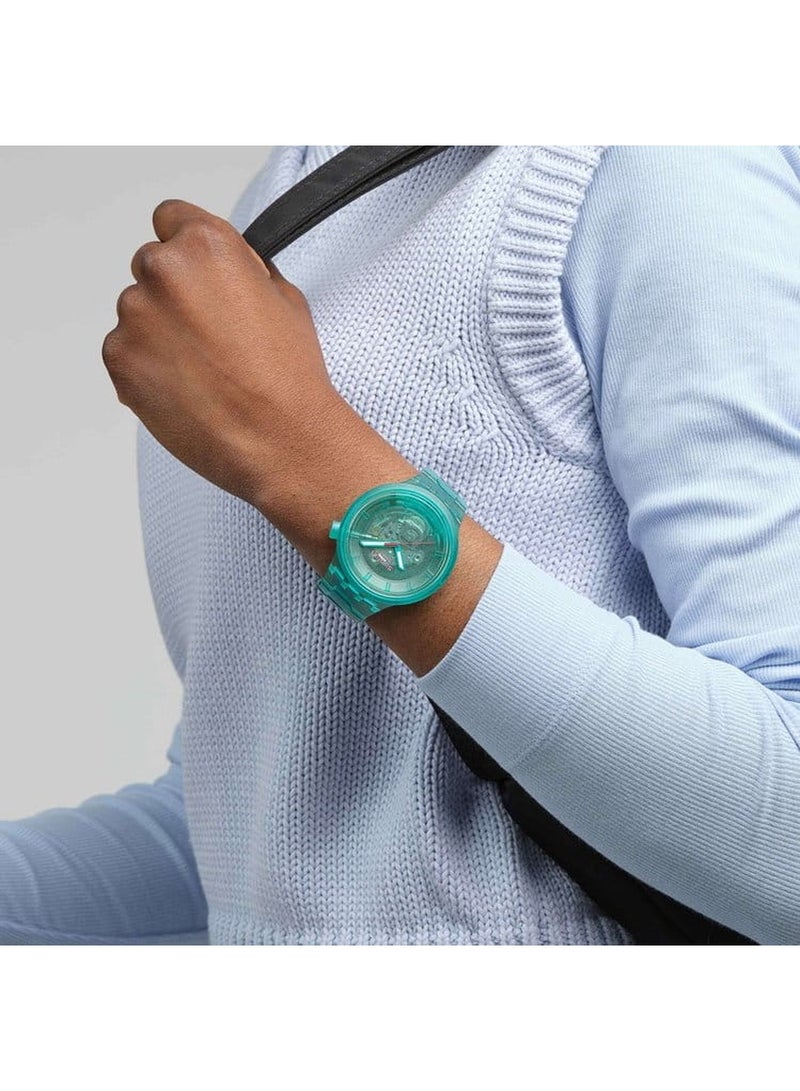 Swatch ساعة كوارتز تناظرية للجنسين باللون التركوازي JOY - Image 3