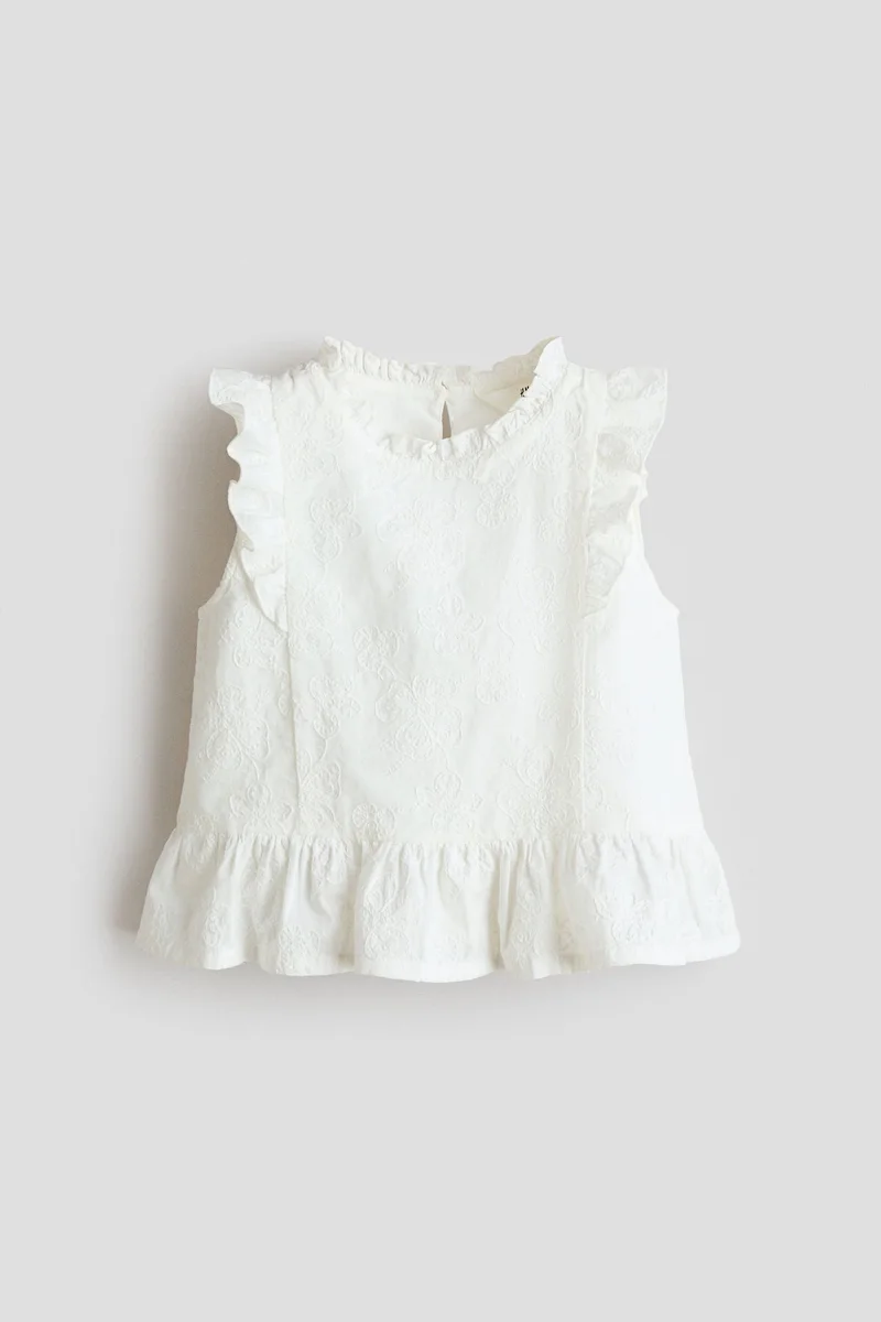 H&M Embroidered cotton peplum top