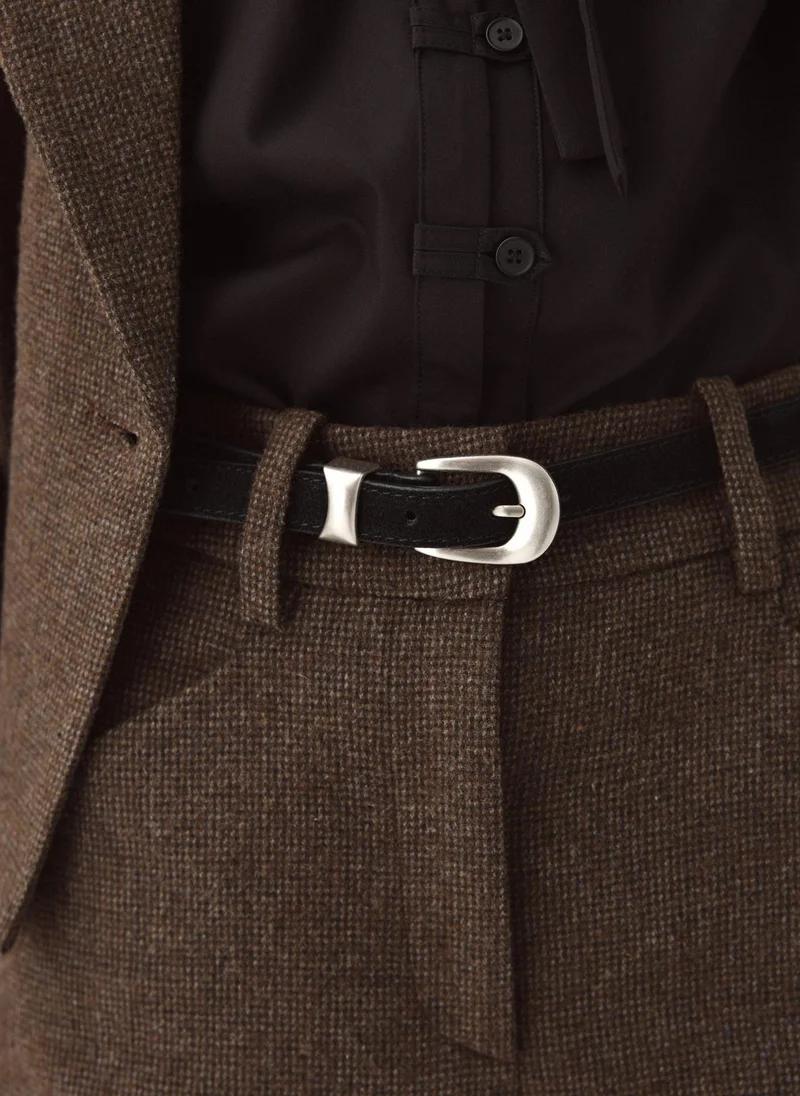 Thin leather belt with a wide buckle