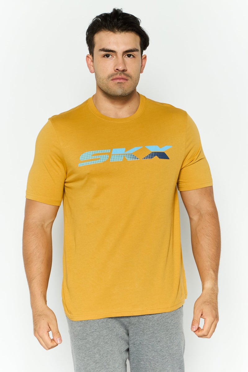 SKECHERS Men Sportswear Fit Short Sleeve Outdoor T Shirt, Gold - Image 1