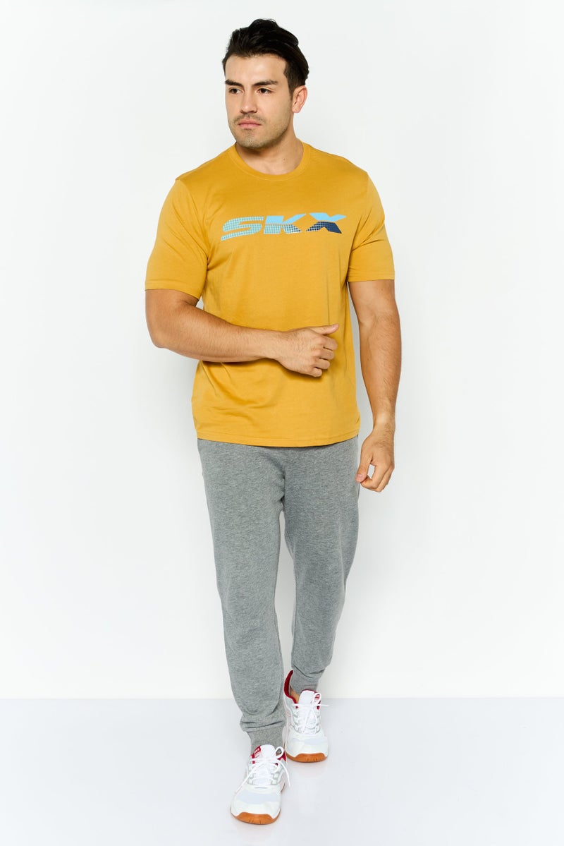 SKECHERS Men Sportswear Fit Short Sleeve Outdoor T Shirt, Gold - Image 2