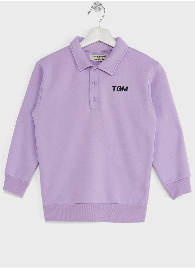 The Giving Movement - Kids Polo Sweatshirt - Image 1