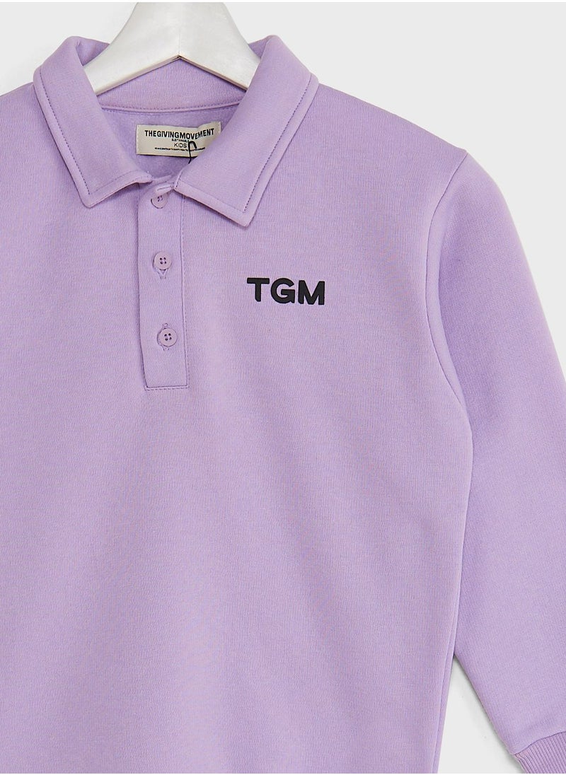 The Giving Movement - Kids Polo Sweatshirt - Image 1