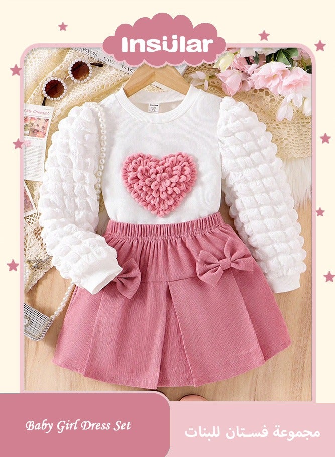 انسولار مجموعة متكاملة للفتيات للاستخدام اليومي والراحة: ملابس علوية علوية مبطنة بنقشة قلوب مضفرة ، تنورة مزينة بفيونكة من المخمل، لطيفة وحلوة للفتيات الصغيرات، للربيع والخريف ، 2 قطعة في المجموعة - Image 1
