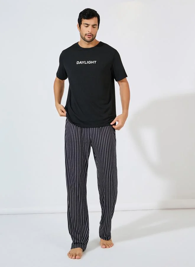 Styli Slogan Print T-Shirt & Striped Pyjama Set
