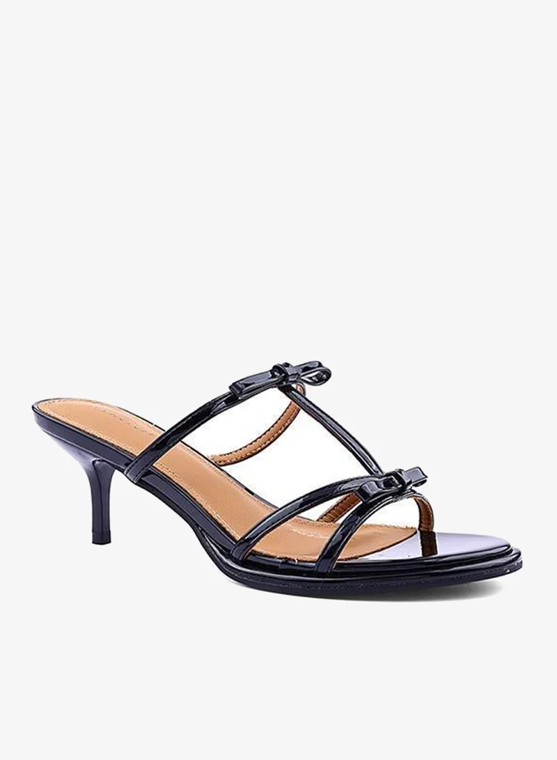 أيقون صنادل نسائية بكعب وحزام متقاطع