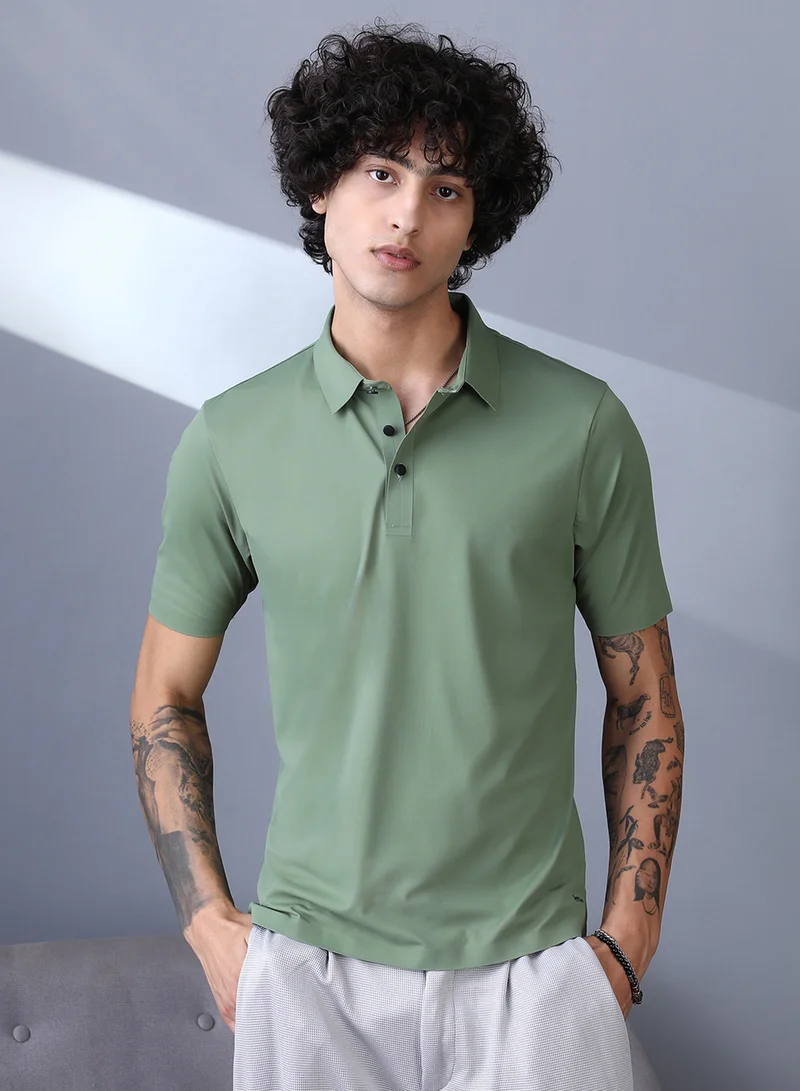 Campus Sutra Campus Sutra Men's Pistachio Green Seamless Touchgrain Polo T-Shirt For Casual Wear | Polo Neck | Short Regular Sleeves | Half-Button Closure | T-Shirt Crafted With Comfort Fit For Everyday Wear