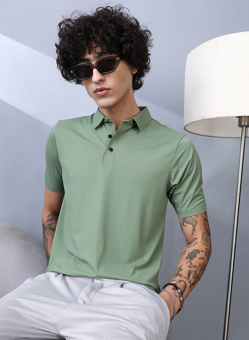 Campus Sutra Campus Sutra Men's Pistachio Green Seamless Touchgrain Polo T-Shirt For Casual Wear | Polo Neck | Short Regular Sleeves | Half-Button Closure | T-Shirt Crafted With Comfort Fit For Everyday Wear