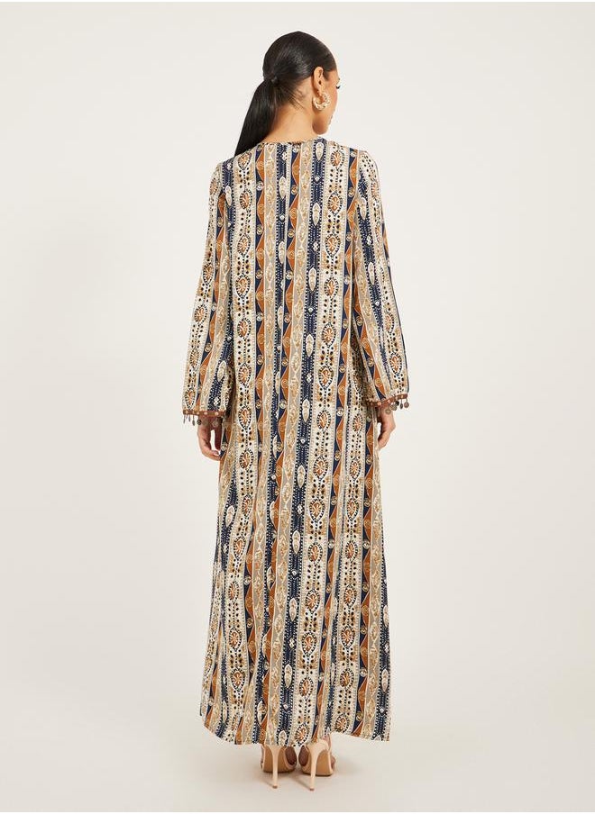 Styli - stripe pattern print A line jalabiya w/ metal tassel trim at neck and sleeve hem - Image 1