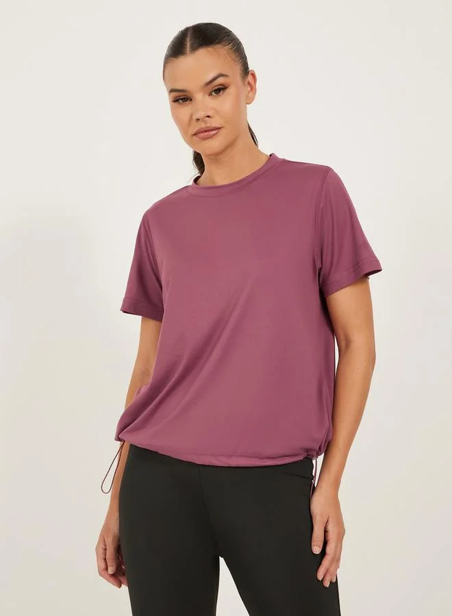 ستايلي اكتيف تيشيرت ستايلي بقصة فضفاضة بلون سادة للأنشطة الرياضية