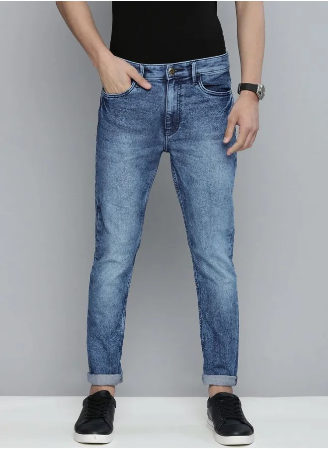 شركة المرآب الهندية Men Slim Fit Solid Mid-Rise Stretchable Jeans