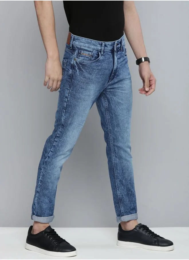شركة المرآب الهندية Men Slim Fit Solid Mid-Rise Stretchable Jeans