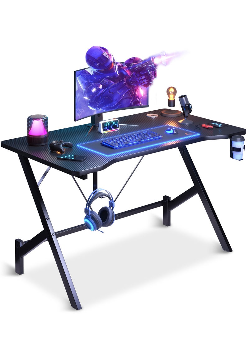 FAMAPY Gaming Desk 110*54*74 cm,Gamer Table With Headphone Hook⋓ Stand,Gaming Desk with Carbon Fibre Surface,Double Cable Hole Writing Study Workstation or Kids Office Table,Ideas for Gamers and Students - Image 1