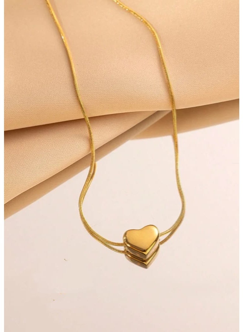 Luxuria Heart-shaped pendant made of stainless steel, plated with 18-karat gold. - Image 2