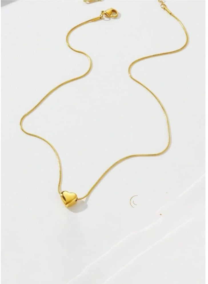 Luxuria Heart-shaped pendant made of stainless steel, plated with 18-karat gold. - Image 5