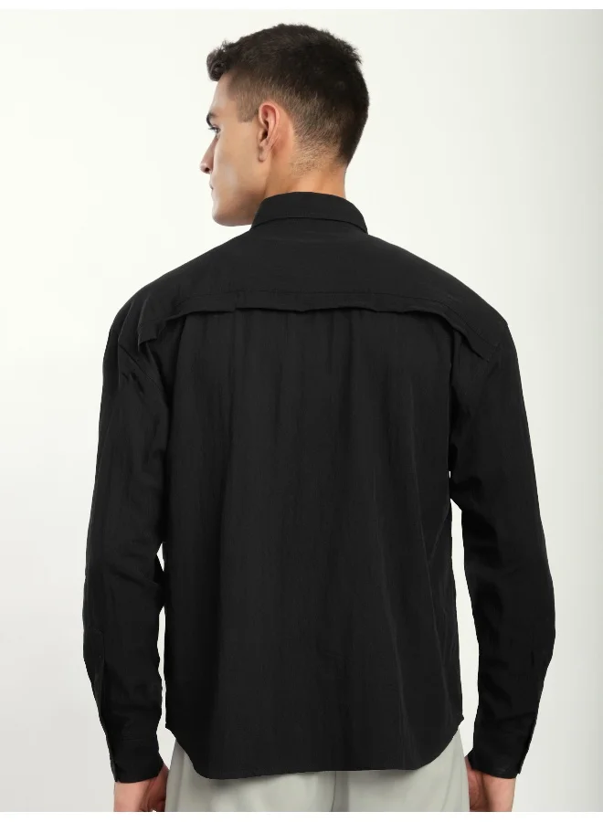 بيونغ قميص أسود مطوي