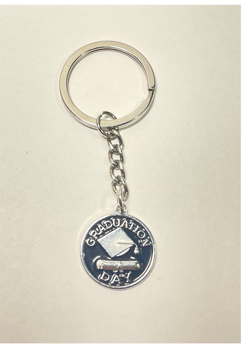 Generic - Distinctive and elegant graduation keychain with graduation cap design graduation document and the graduation year 2023 in silver color - Image 1
