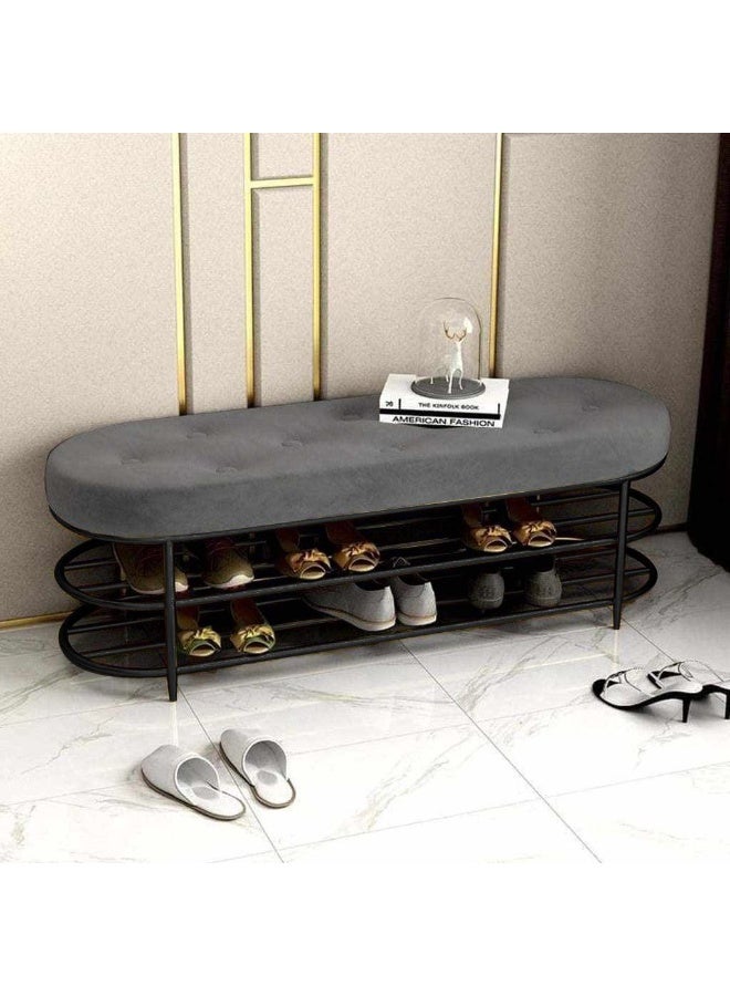 Modern banquet with storage attachments, black steel frame, gray upholstery surface