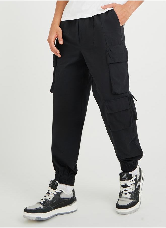 Styli Styli Men Black Solid Cotton Twill Utility Relaxed Joggers with Multi Pockets  - Image 1