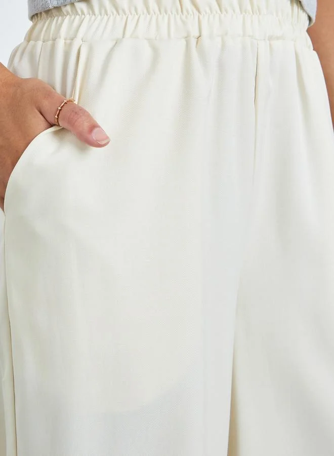 Styli  Cream Wide Leg Pants with Pocket for Women | Best Price UAE