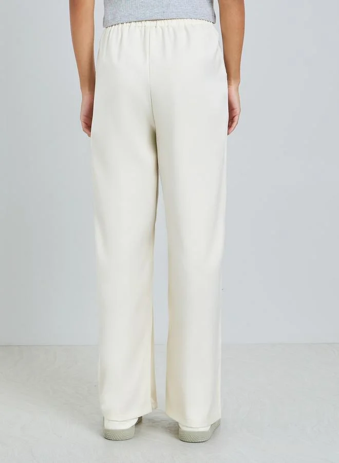 Styli  Cream Wide Leg Pants with Pocket for Women | Best Price UAE