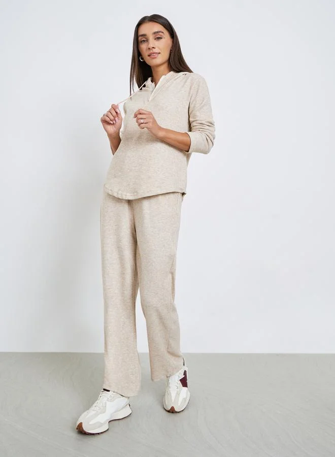 ستايلي طقم منسق من بلوزة بقبعة وبنطال