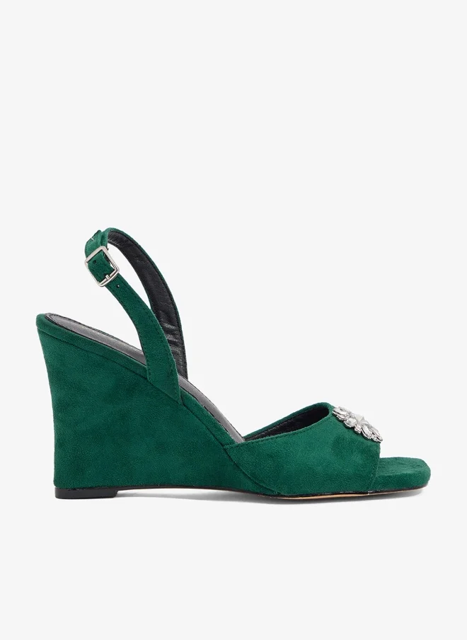 خزانة صندل إسفين أخضر زمردي ببروش زهرة كريستالية وحزام خلفي