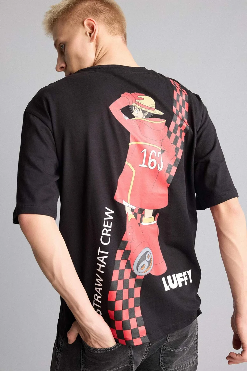 ديفاكتو One Piece Boxy Fit Printed Short Sleeve T-Shirt