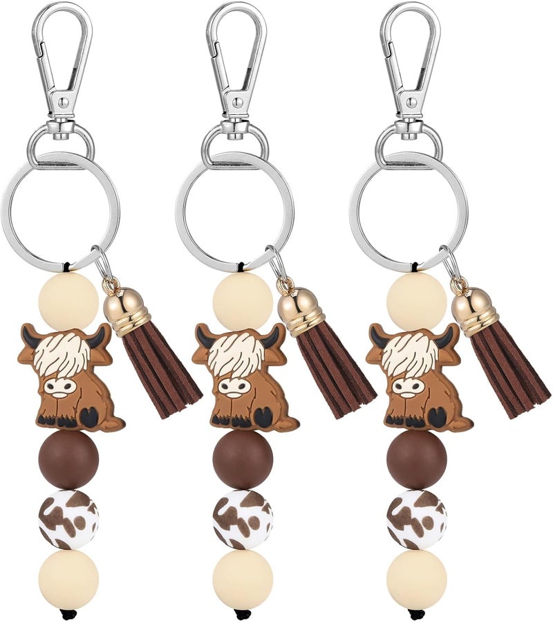 Highland Cow Keychain Set with Tassel - Pack of 3 , 14 . 5 cm Decorative Beaded Design - Image 1