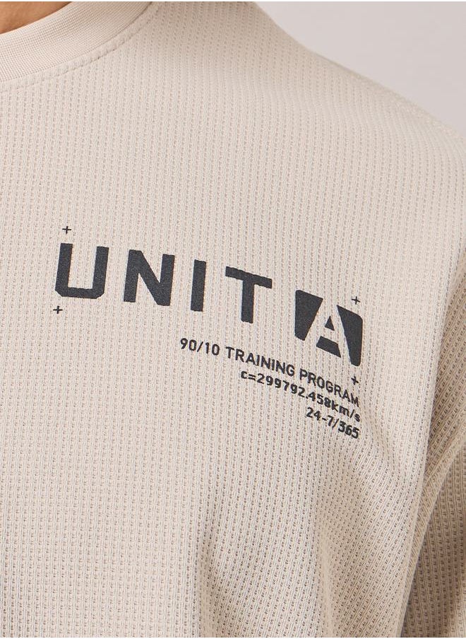 ANTA - Logo Print Waffle Knit T-Shirt - Image 1