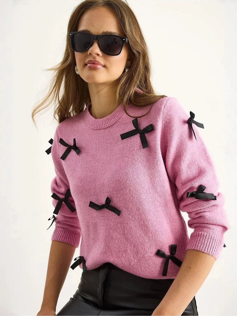 بيانكو لوتشي كنزة بياقة دائرية بتفاصيل فيونكة من لوتشي