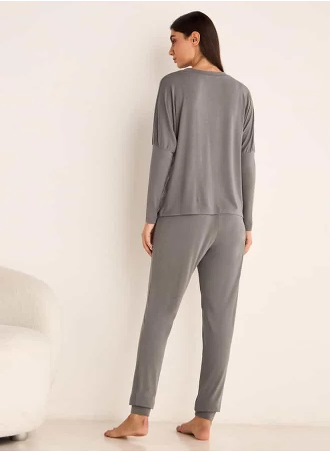 Aadaraya Aadaraya Drop Shoulder Long Sleeve T-shirt and Elasticated Joggers Set