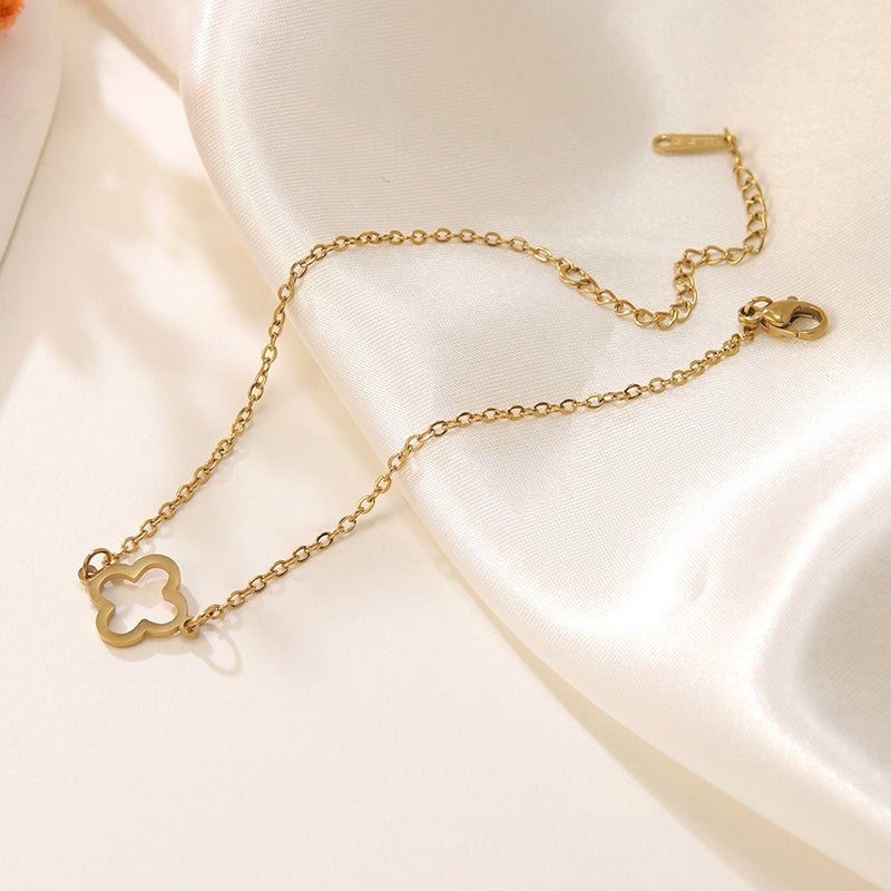Luxury Stainless Steel Four-Leaf Clover Bracelet with 18K Gold Plating and Zirconia - Elegant, Versatile, and Trendy