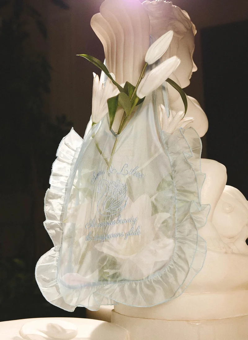 Chiffon bag with ruffles and embroidery