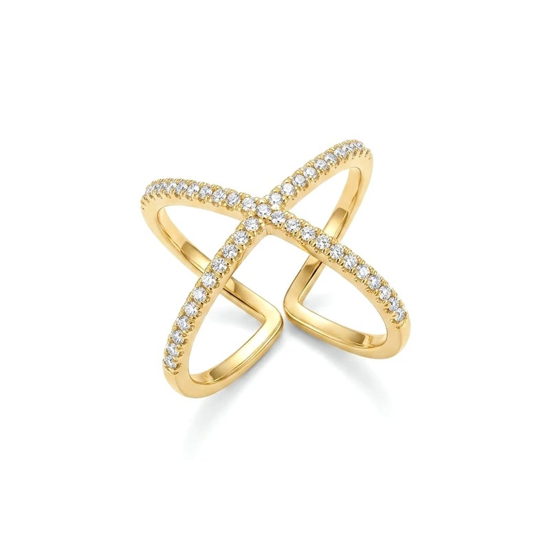 An elegant gold ring with a cross design, adorned with delicate rows of sparkling zircon stones. The open, adjustable design offers a modern and luxurious look that perfectly suits you. - Image 2