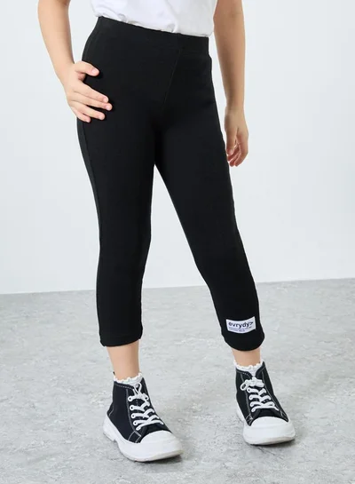 Styli Girls Black Ribbed Leggings with Badge Detail