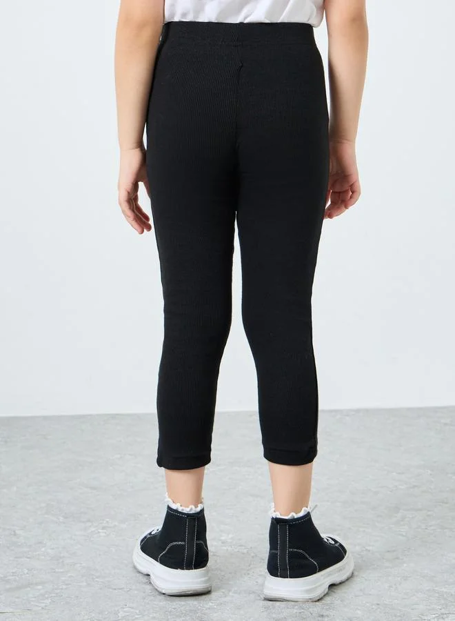 Styli Girls Black Ribbed Leggings with Badge Detail