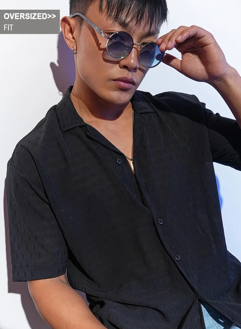 Campus Sutra Campus Sutra Men's Midnight Black Oversized Woven Shirt For Casual Wear | Cuban Collar | Short Sleeve | Button Closure | Oversized Shirt Crafted With Comfort Fit For Everyday Wear