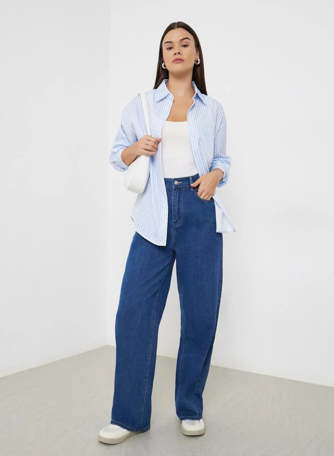 ستايلي بلوزة واسعة مخططة بأكمام طويلة