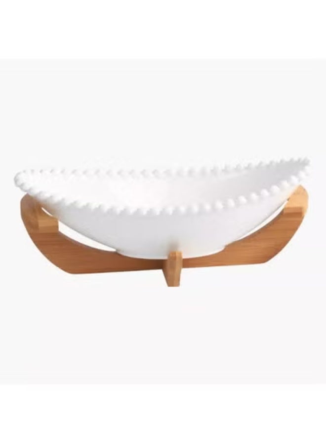 An elegant oval porcelain fruit bowl with a wooden base that adds a modern and stylish touch to your serving table. - Image 4