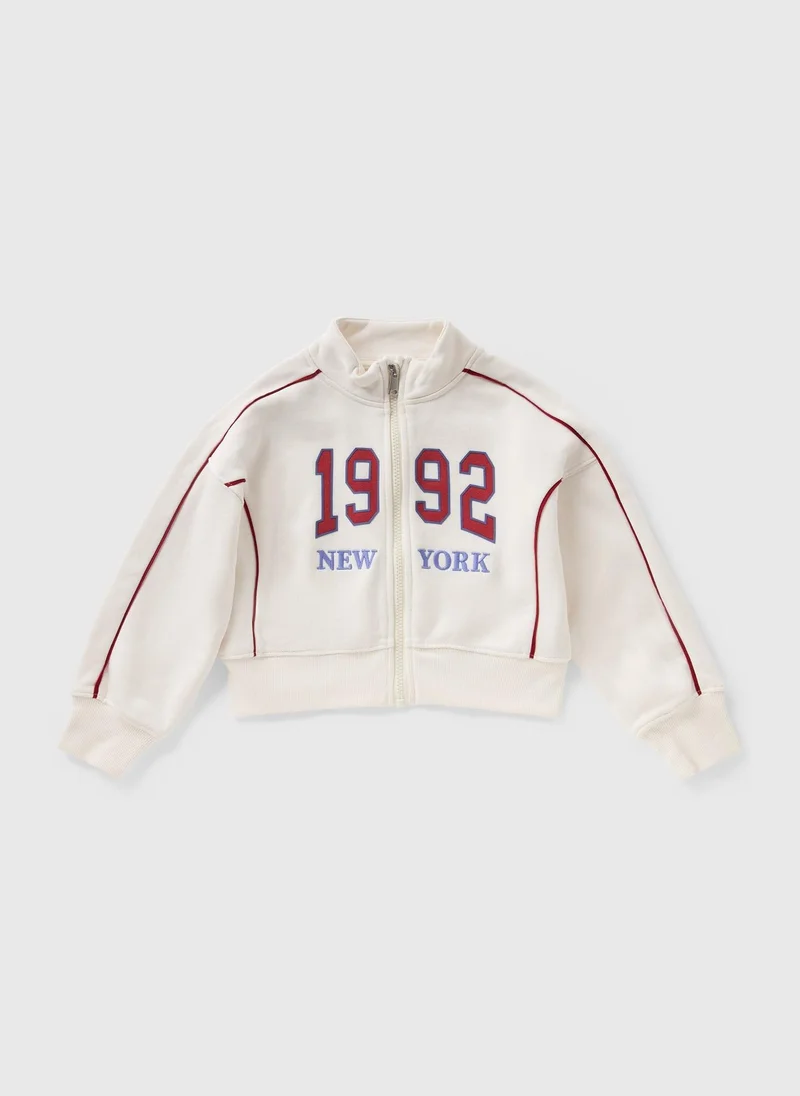 ماتلان Girls Cream New York Cropped Zip Up Sweatshirt