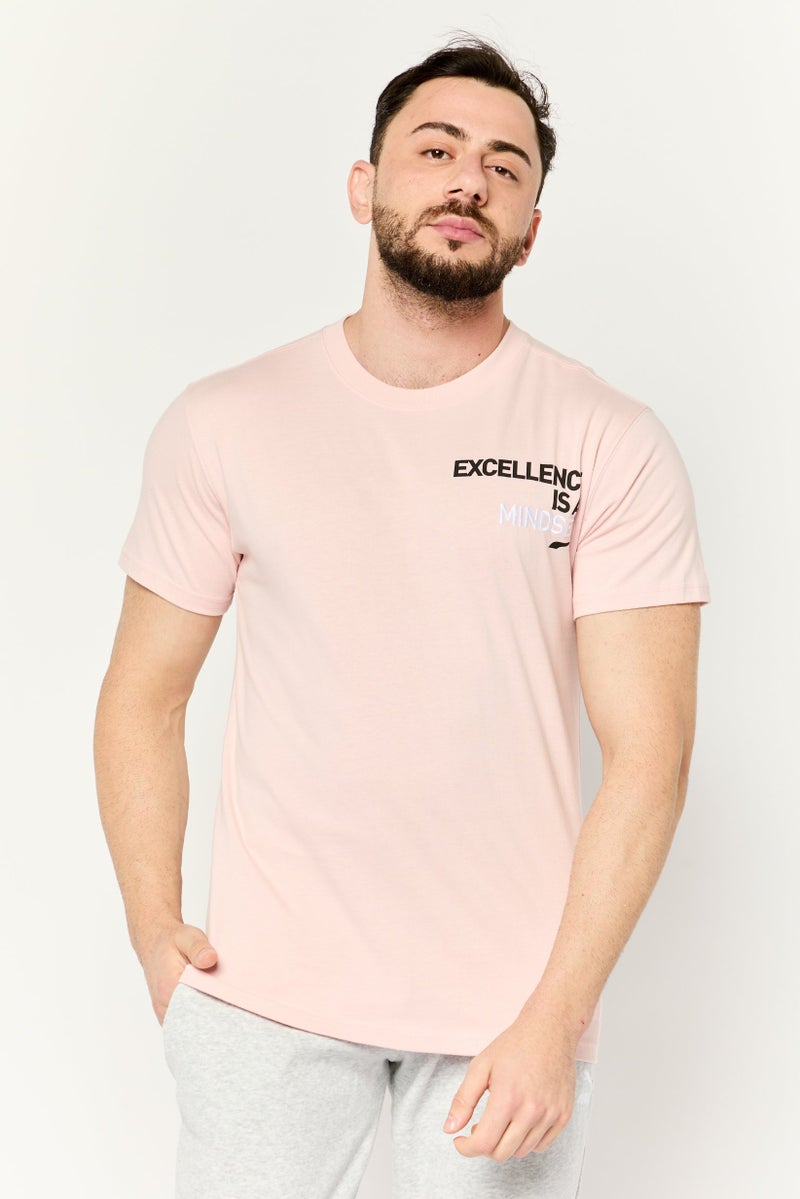 PUMA Men Sportswear Fit Embroidered Short Sleeves Outdoor T-Shirt, Pink - Image 1