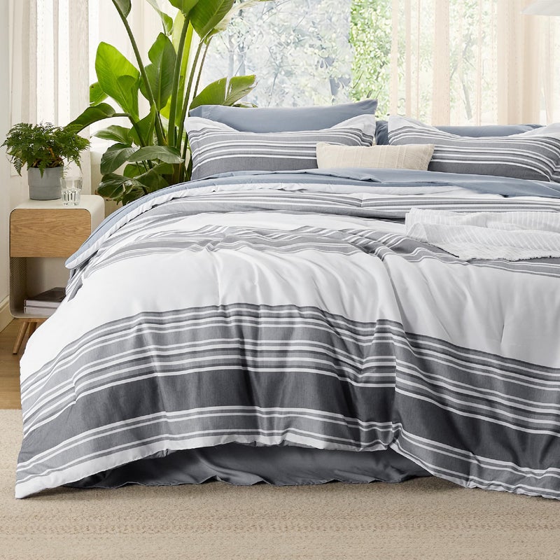 Bedsure King Size Comforter Set 7 Pieces Bed in a Bag, Cationic Dyeing, Reversible, Bedding Set for All Seasons with 1 Comforter (265 cm x 230 cm), 1 Fitted Sheet (198 cm x 203 cm) with 35 cm Deep Pocket,  1 Flat Sheet (275 cm x 260 cm) , 2 Pillowcases (50 cm x 100 cm) & 2 Pillow Shams (50 cm x 90 cm), Dark Grey Striped - Image 1