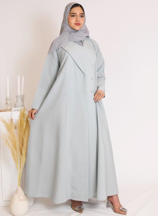 عباية بليزر باللون التيفاني مغلقة بازرار وكم ضيق مزين بأزرار - pzsku/ZB19FB695B7C247588B21Z/45/1747048661/8fb04173-214c-421d-b6de-f62b9bf0d259
