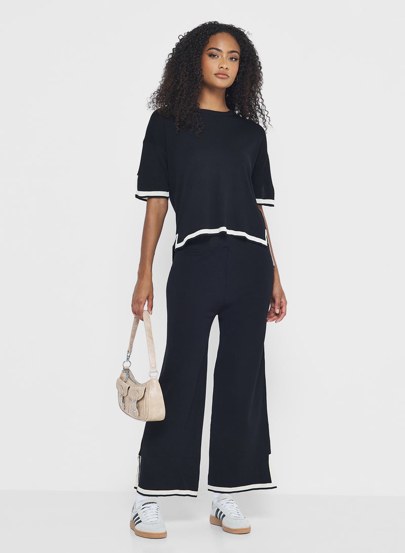 جينجر طقم بلوزة وبنطلون محبوك فضفاض بتفاصيل حواف متباينة - Image 5