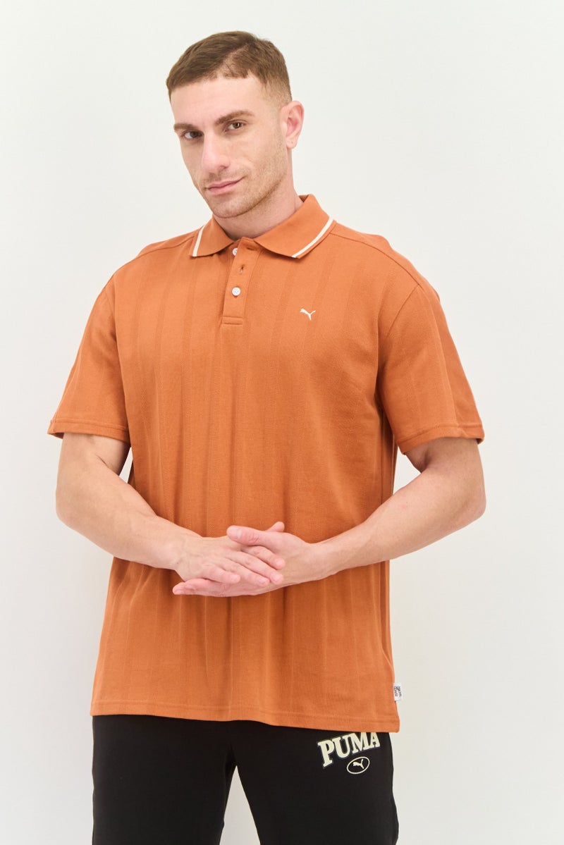 PUMA Puma x Select Men Sportswear Fit Short Sleeve Outdoor Polo Shirt, Rust  - Image 1