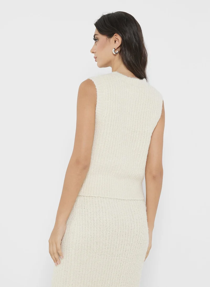 فورث اند ريكلس بلوزة محبوكة بتفاصيل أزرار